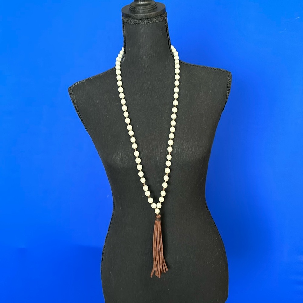 White pearl and brown leather tassel necklace. Adjustable chain - 22 -24” L
